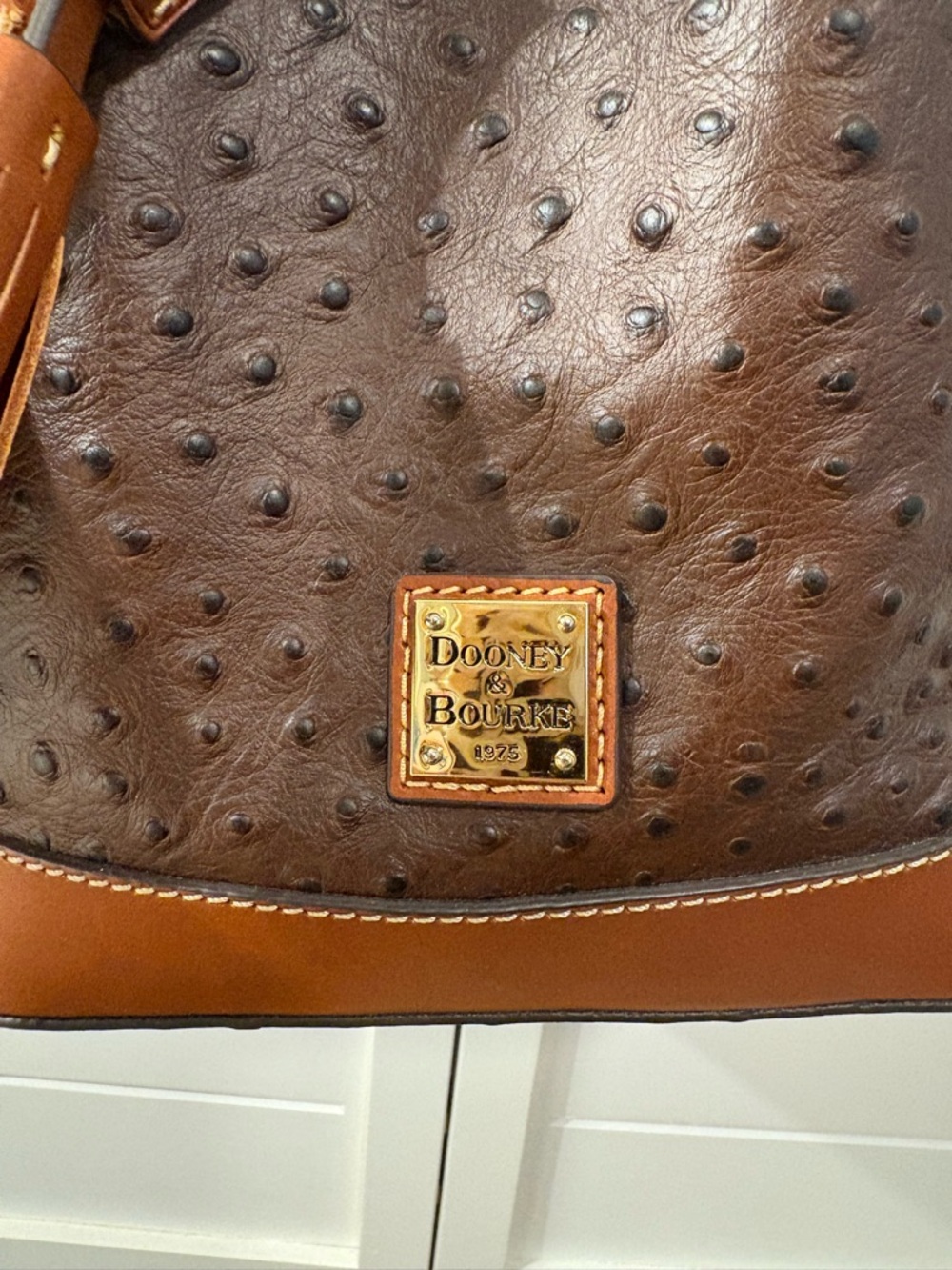 Dooney & Bourke Ostrich Brown Bucket Shoulder Bag with Tassel - Picture 2 of 5